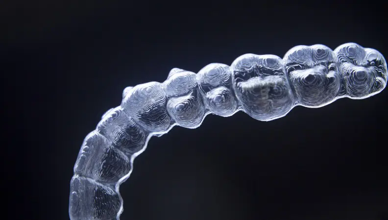 Close up of Invisalign clear aligner