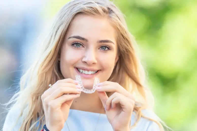 Girl smiling with Invisalign